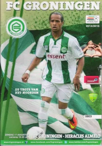 scan matchday programme (programmaboekje) 17.08.2014 | Groningen — Heracles (NL Eredivisie 2014/15) Jarchinio Antonia on cover.
