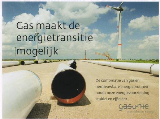 Gasunie landscape advertisement showing gas pipes alongside wind turbines and the transition slogan 2015