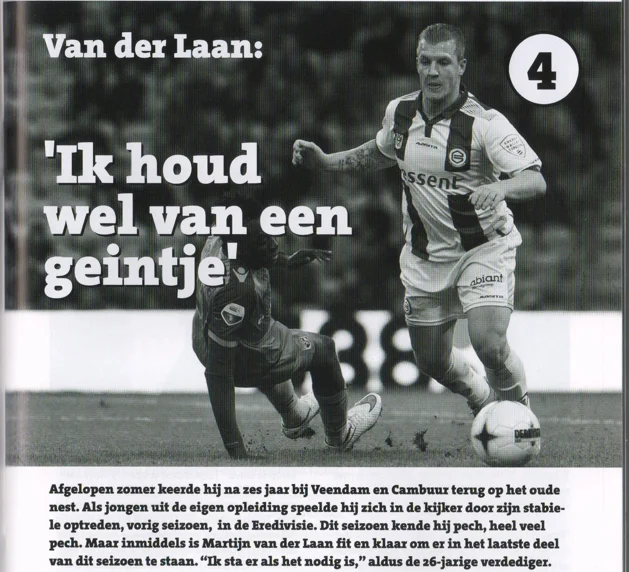 action photograph of Martijn van der Laan (number 4) sliding to tackle a ball from Groningen Cambuur 2015 matchday programme.