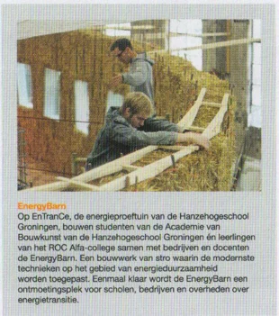 the wooden/straw structure of the EnergyBarn and the informational text block beside it.