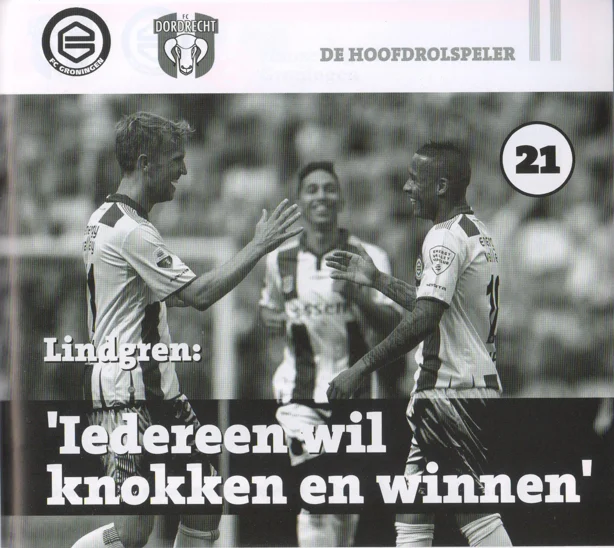 black and white action photo of Rasmus Lindgren (number 21) celebrating with a teammate from page of Groningen Dordrecht 2015 programme