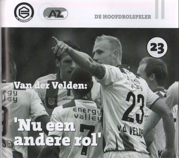 action photo of Nick van der Velden (number 23) celebrating with his fist raised from Groningen AZ 2015 programme